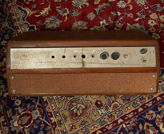 This amp powers on, but is missing components, consists of a stripped down non-original circuit, and is overall in poor cosmetic condition.